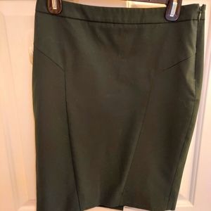 Cute above knee skirt with side zipper.  Color is forest green